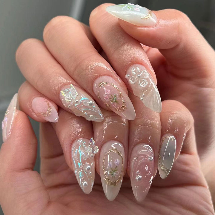 Elegant Stiletto Nail Art Extensions with Floral Embellishments Stornfield