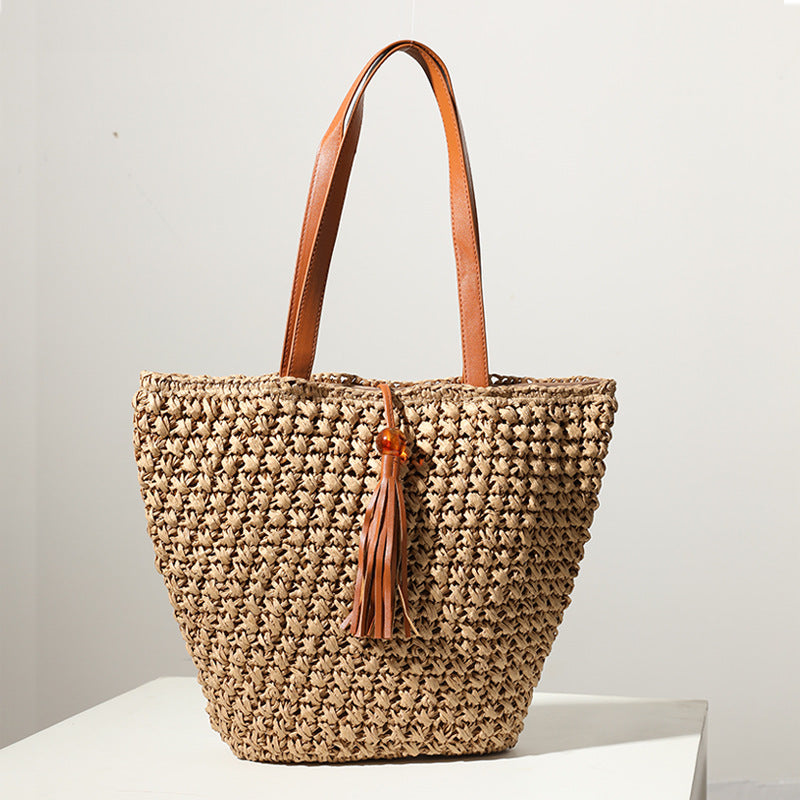 Handcrafted basket bag with fashionable tassel detail Stornfield