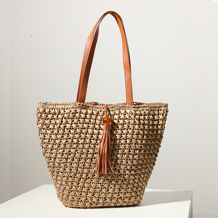Handcrafted basket bag with fashionable tassel detail Stornfield