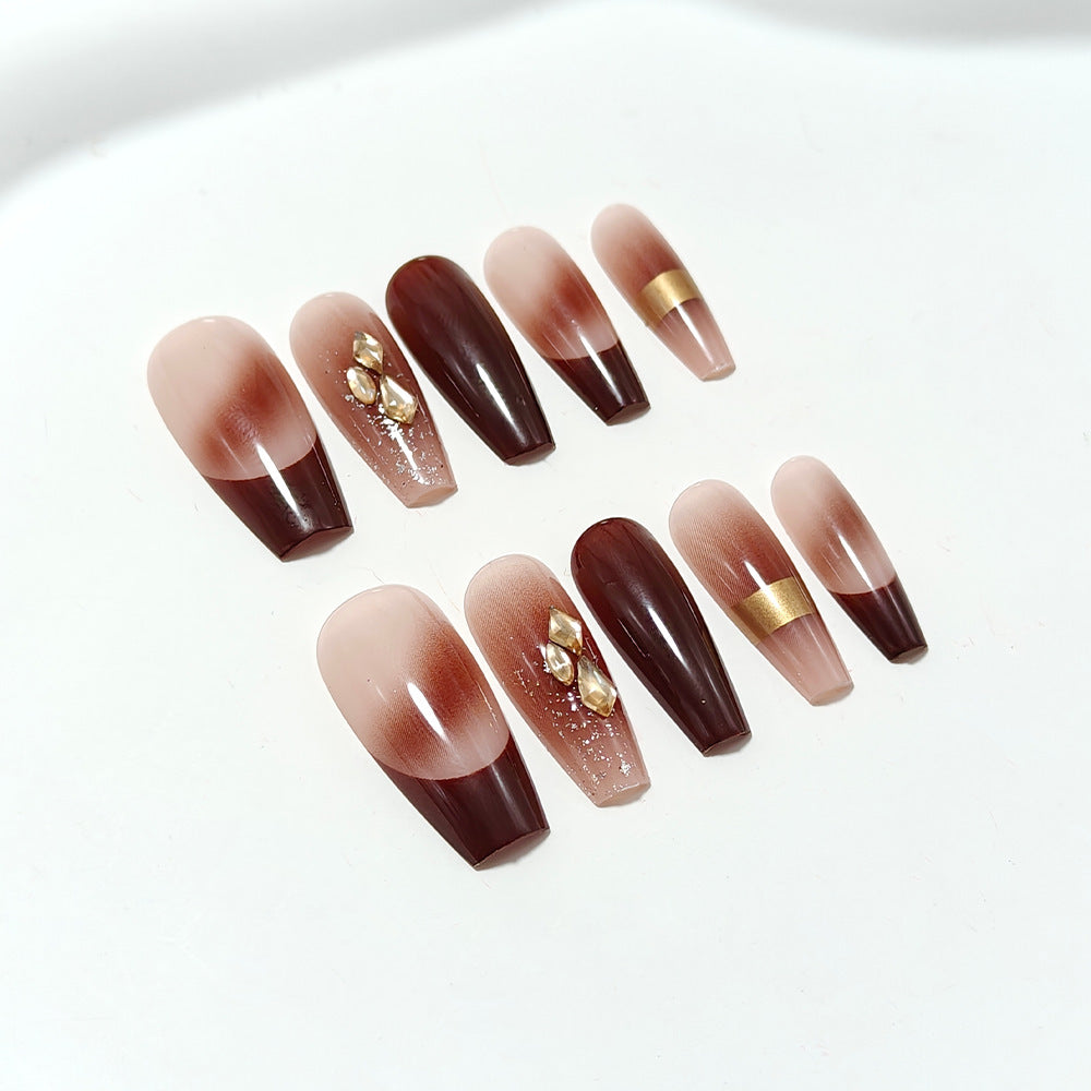 Luxurious artificial nails with glamorous decorations Stornfield