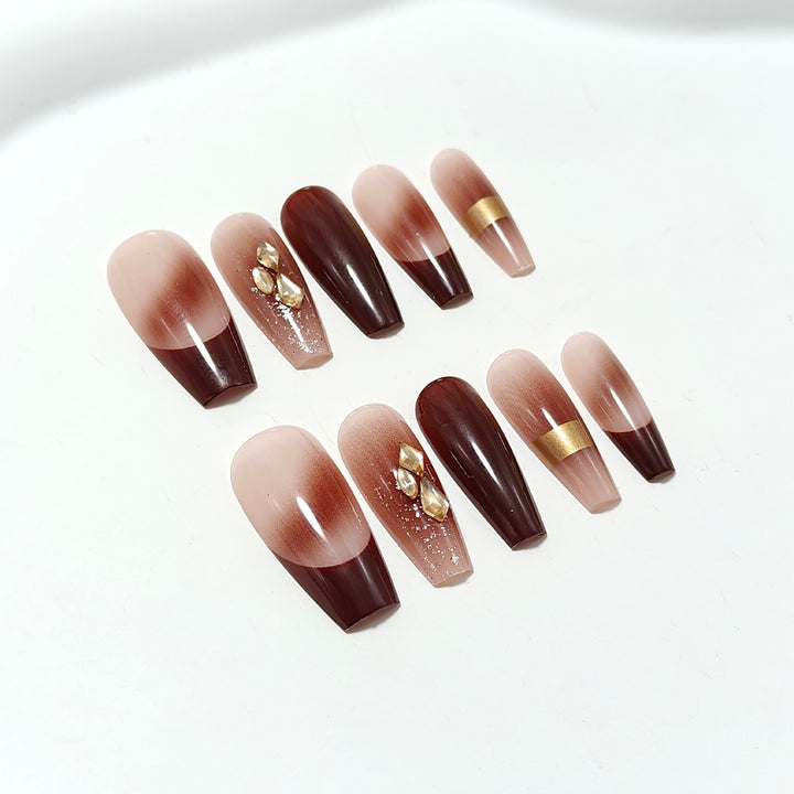 Luxurious artificial nails with glamorous decorations Stornfield