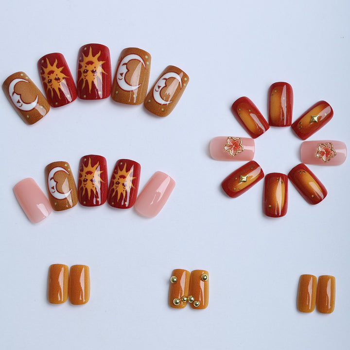 Artificial nails with floral motifs and glitter accents Stornfield