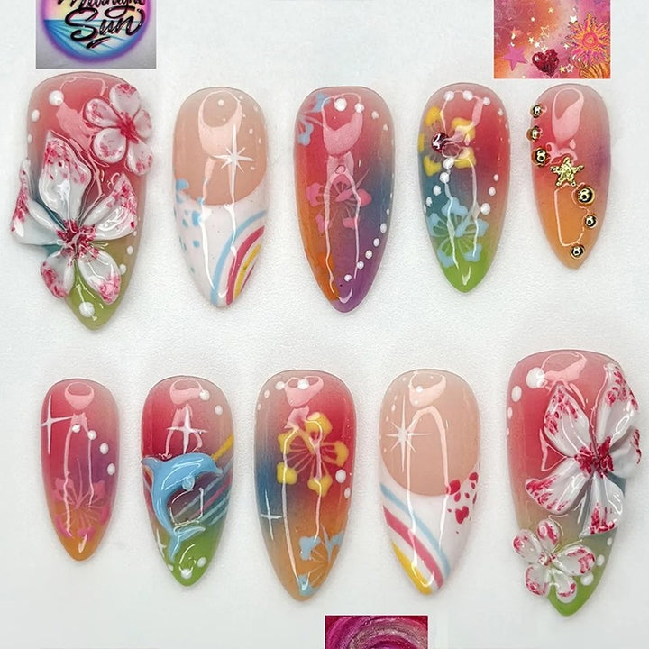 Artificial nail set with various designs and shiny embellishments Stornfield