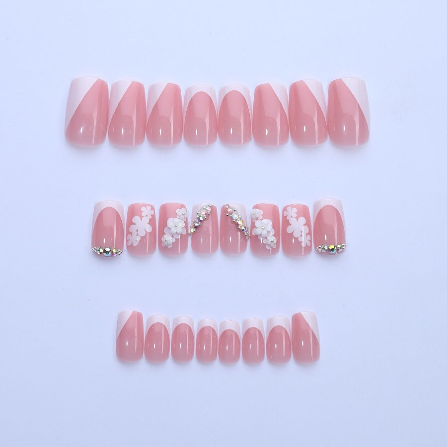 Artificial nail set with flower and glitter details Stornfield