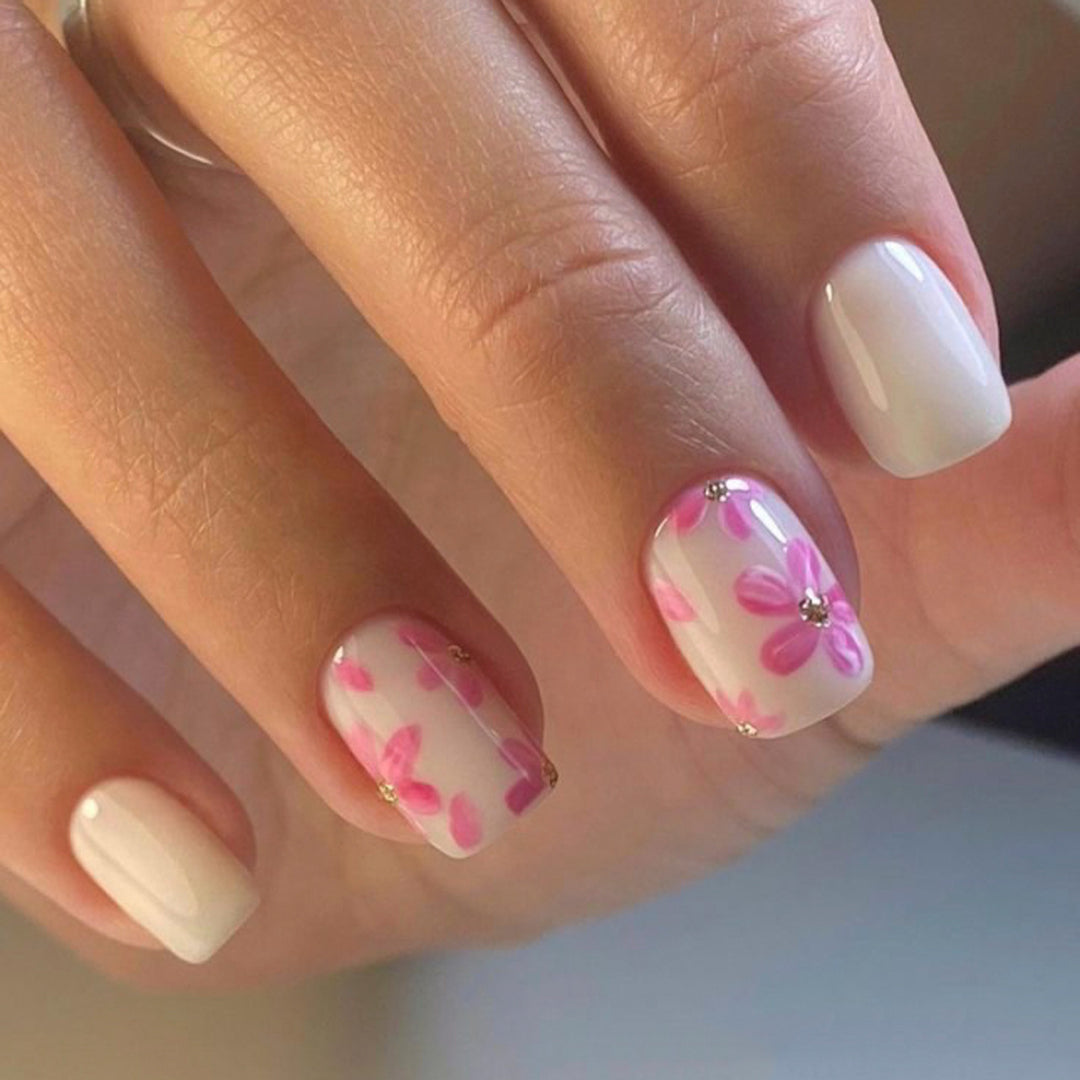 Stylish artificial nail design with floral accents Stornfield