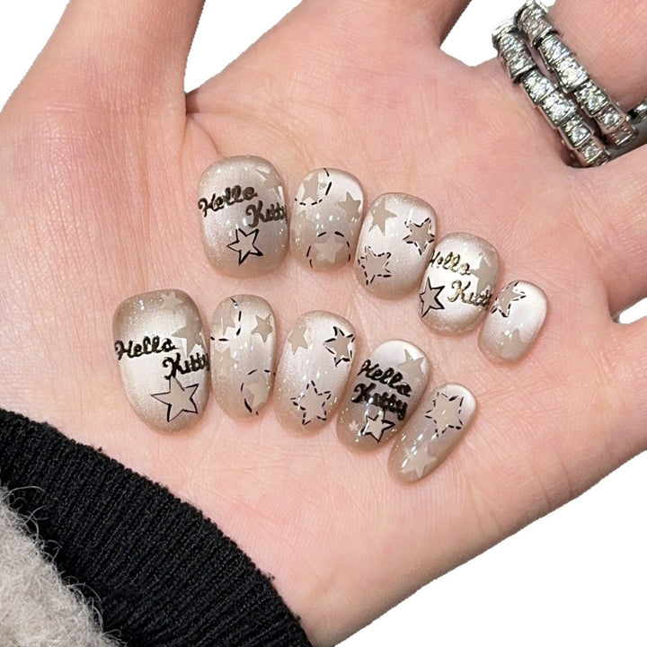 Artificial nail tips with Hello Kitty design Stornfield