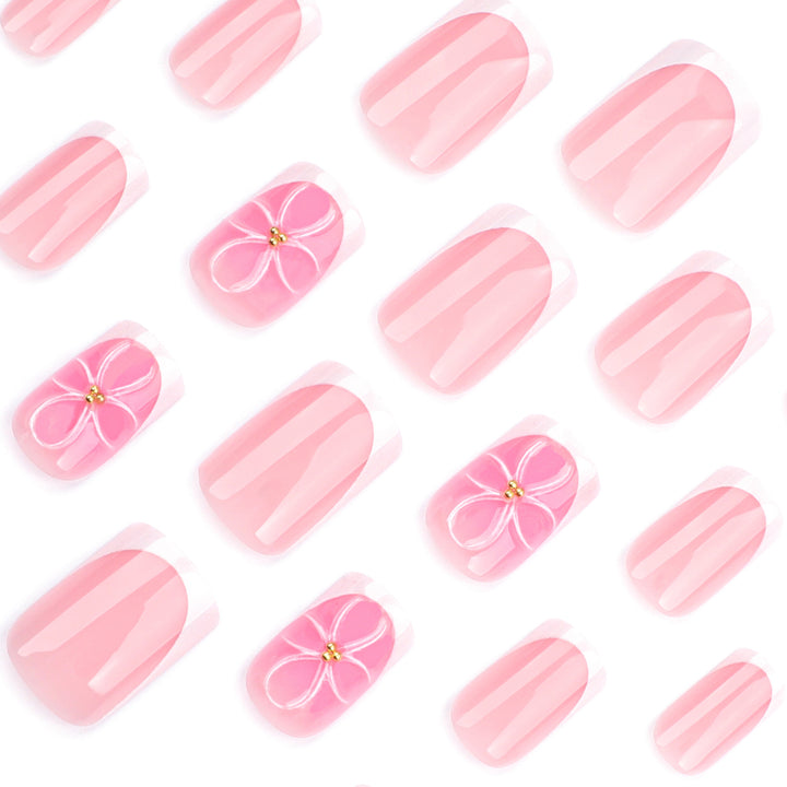 Artistic nail art with delicate flowers and elegant French lace Stornfield