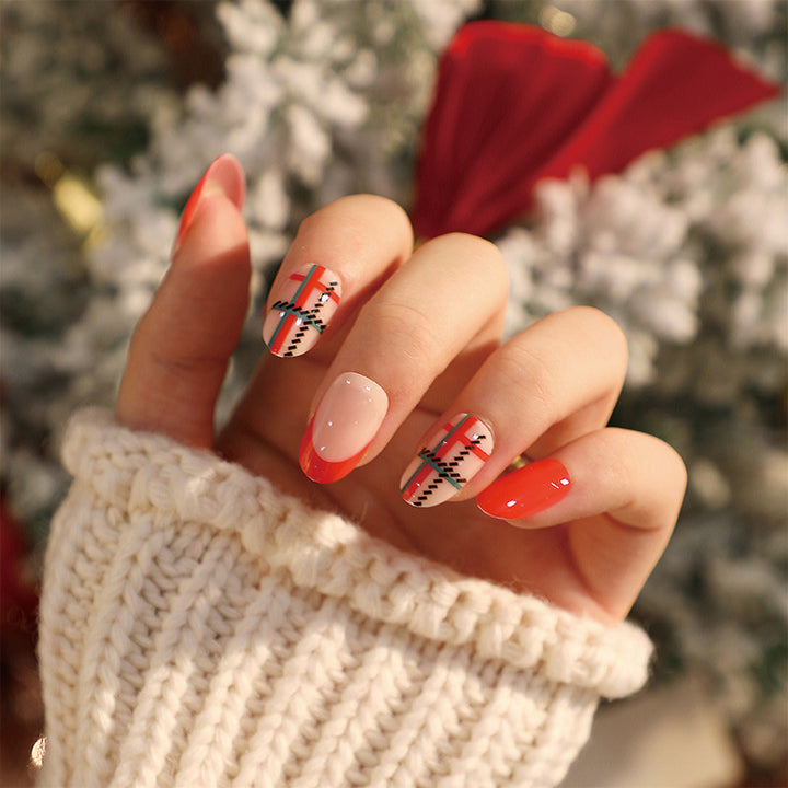Elegant artificial nails with golden accents and floral design Stornfield