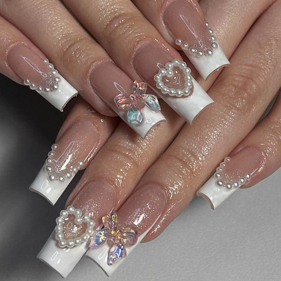 Acrylic nail set with elegant pearl and 3D flower decorations Stornfield