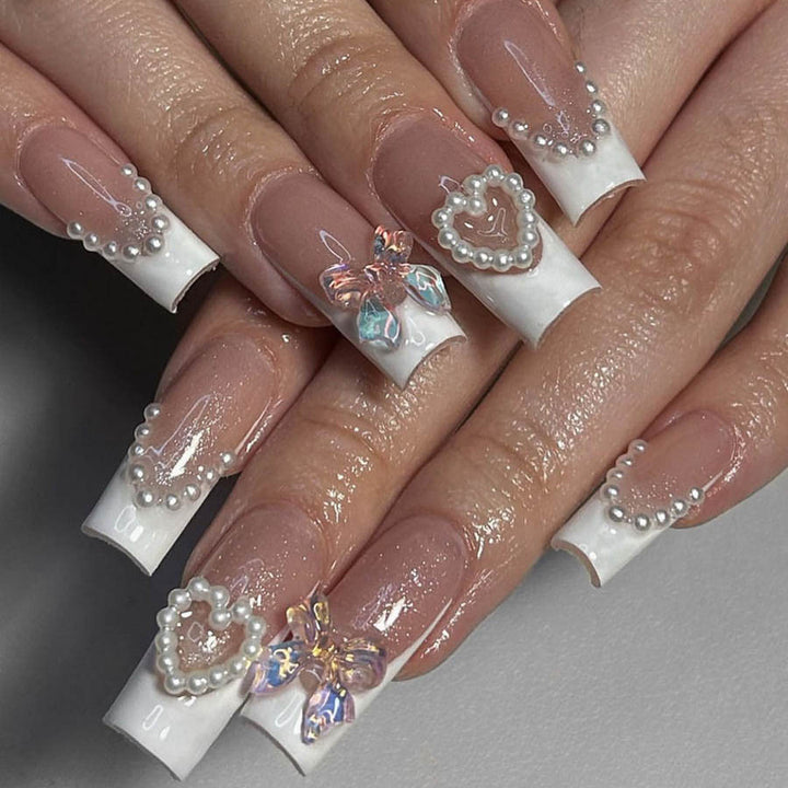 Acrylic nail set with elegant pearl and 3D flower decorations Stornfield