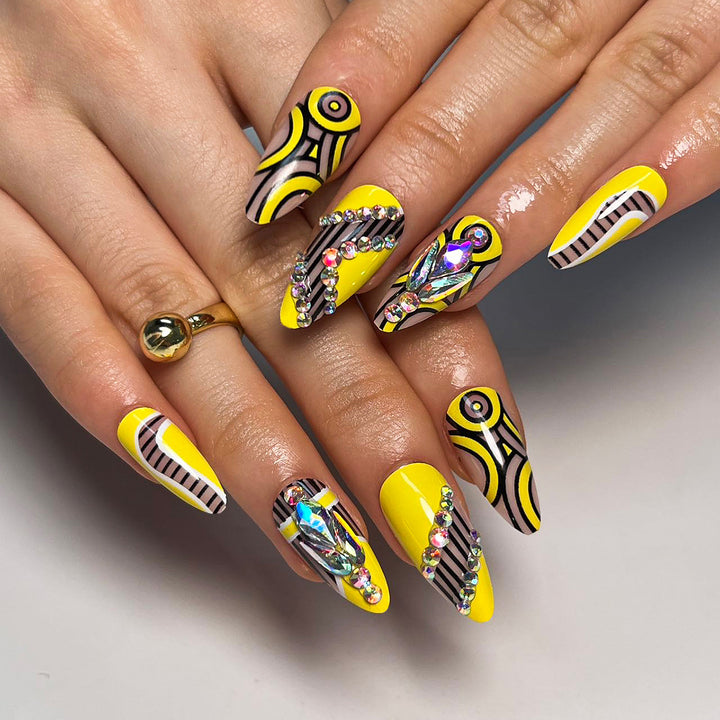 Artful nail extensions with geometric design and glitter accents Stornfield