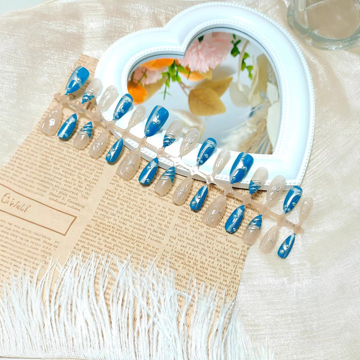Artificial nails with creative shimmer design Stornfield