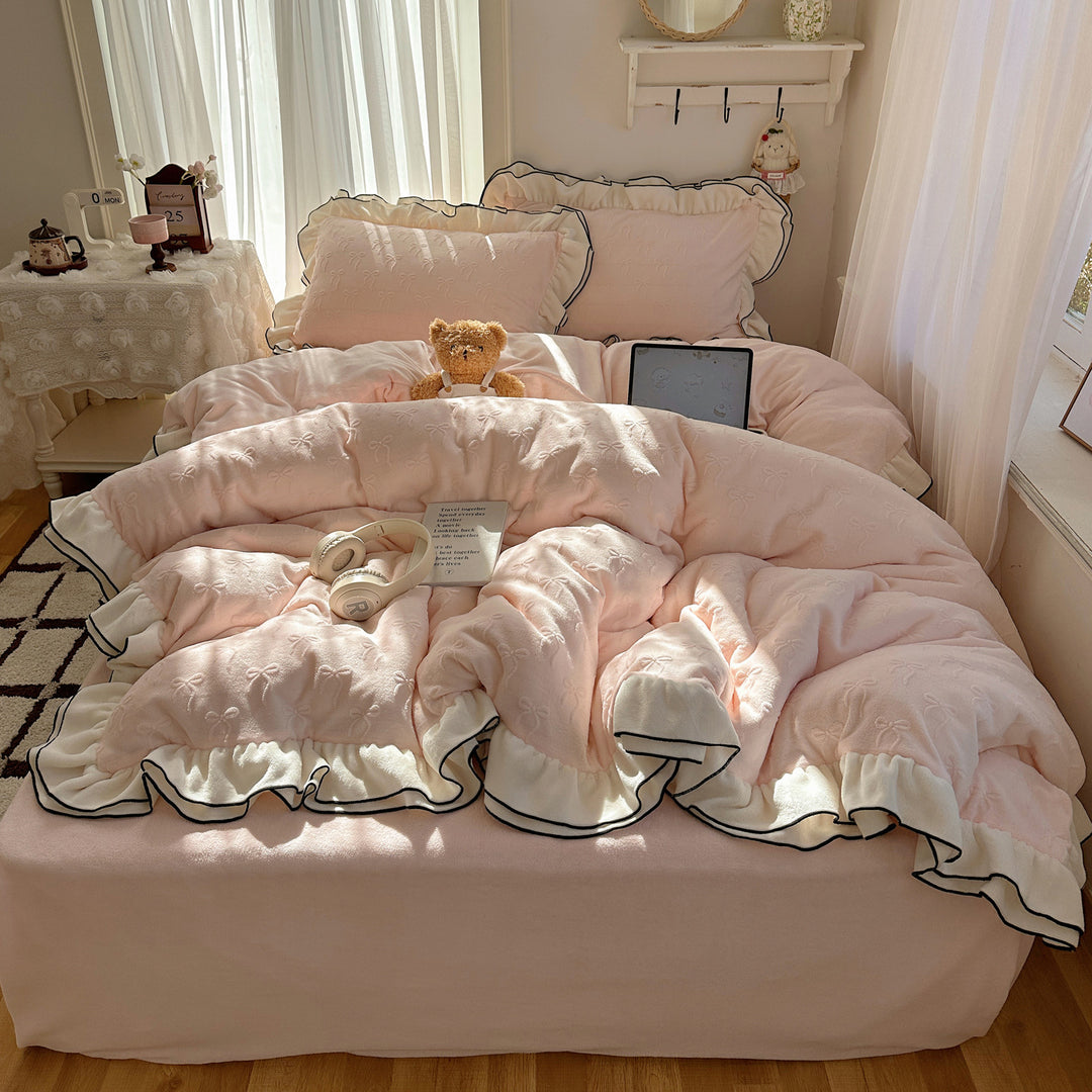 Cozy quilted bedding set with relief ribbon embroidery and contrasting ruffle edge
