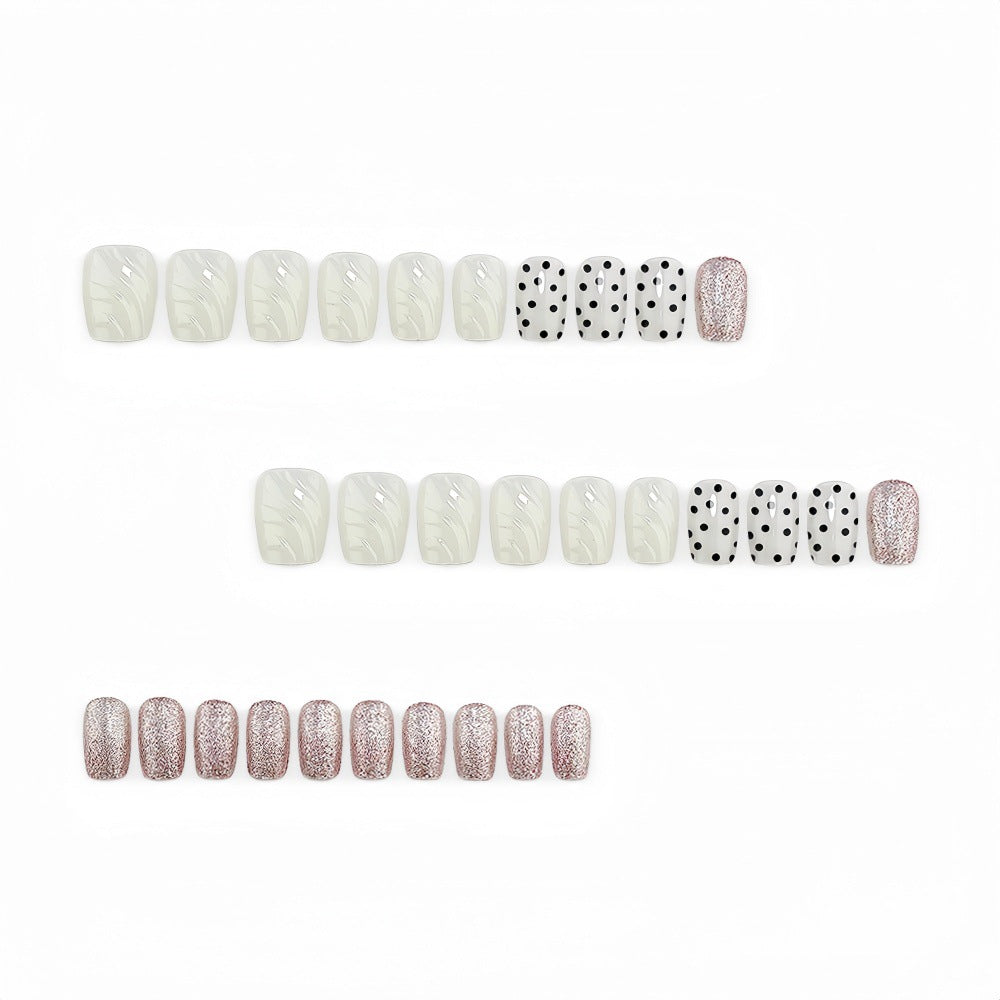 Artificial nails with diverse patterns and glitter effects Stornfield