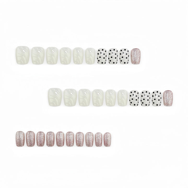 Artificial nails with diverse patterns and glitter effects Stornfield