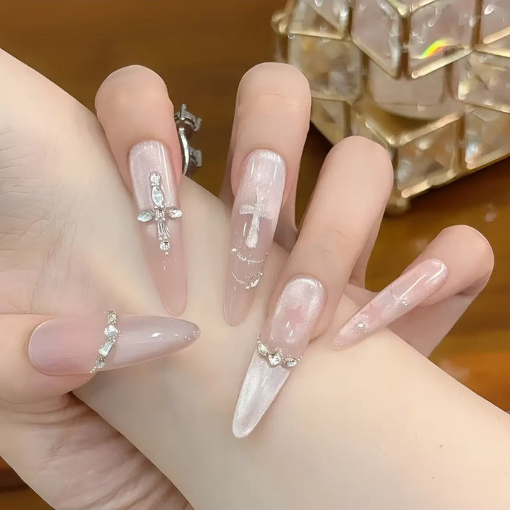 Glamorous Stiletto Nail Extensions with Rhinestone Accents