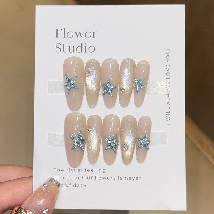 Glamorous artificial nails with star accents Stornfield