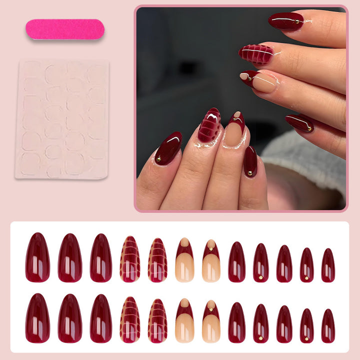 Acrylic nail set with elegant golden accents and trendy design Stornfield