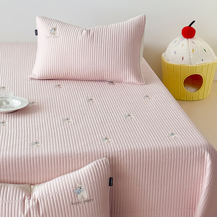Padded fitted sheet set with vertical quilting and subtle floral embroidery