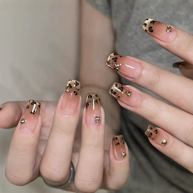 Elegant artificial nails with sparkling gold accents Stornfield