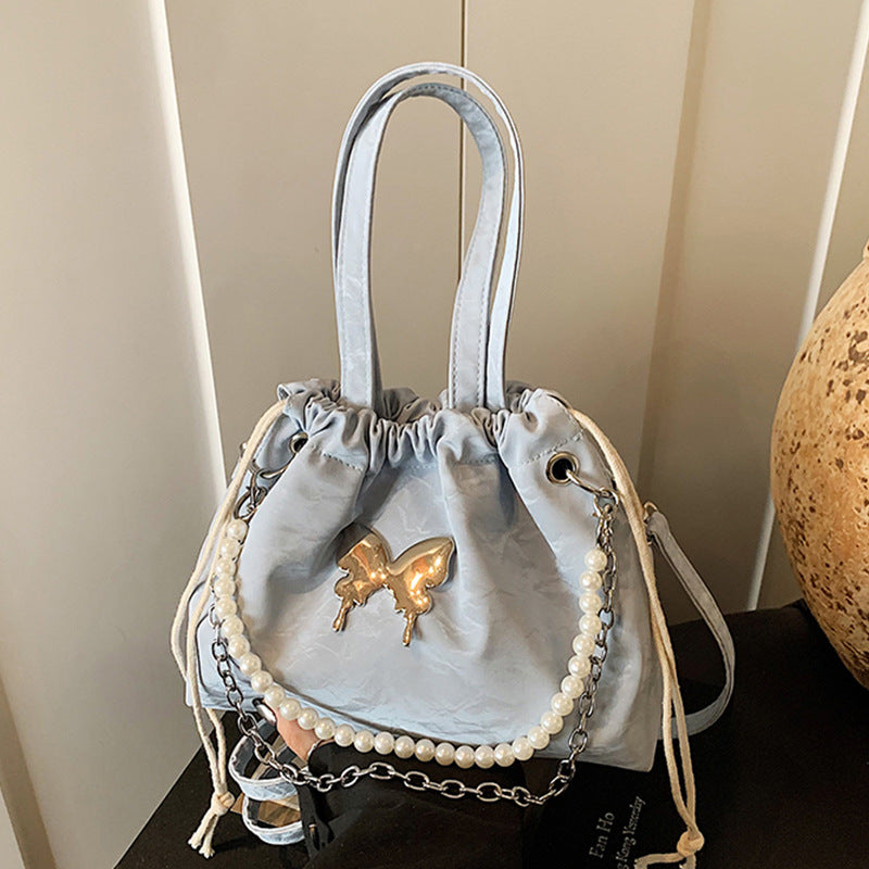 Elegant Pearl-Accented Mini Drawstring Handbag