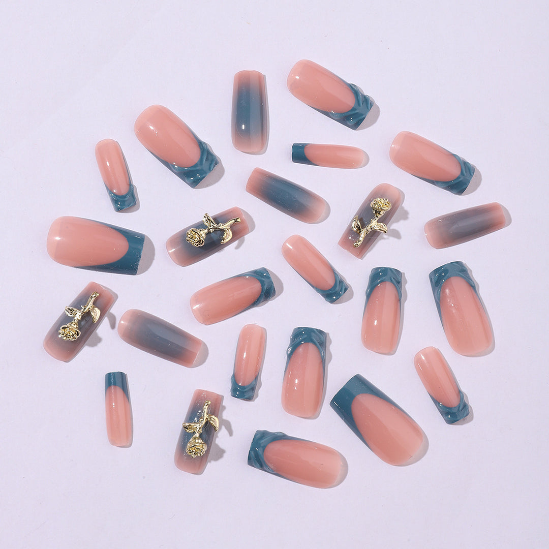 Elegant artificial nail creations with golden embellishments Stornfield