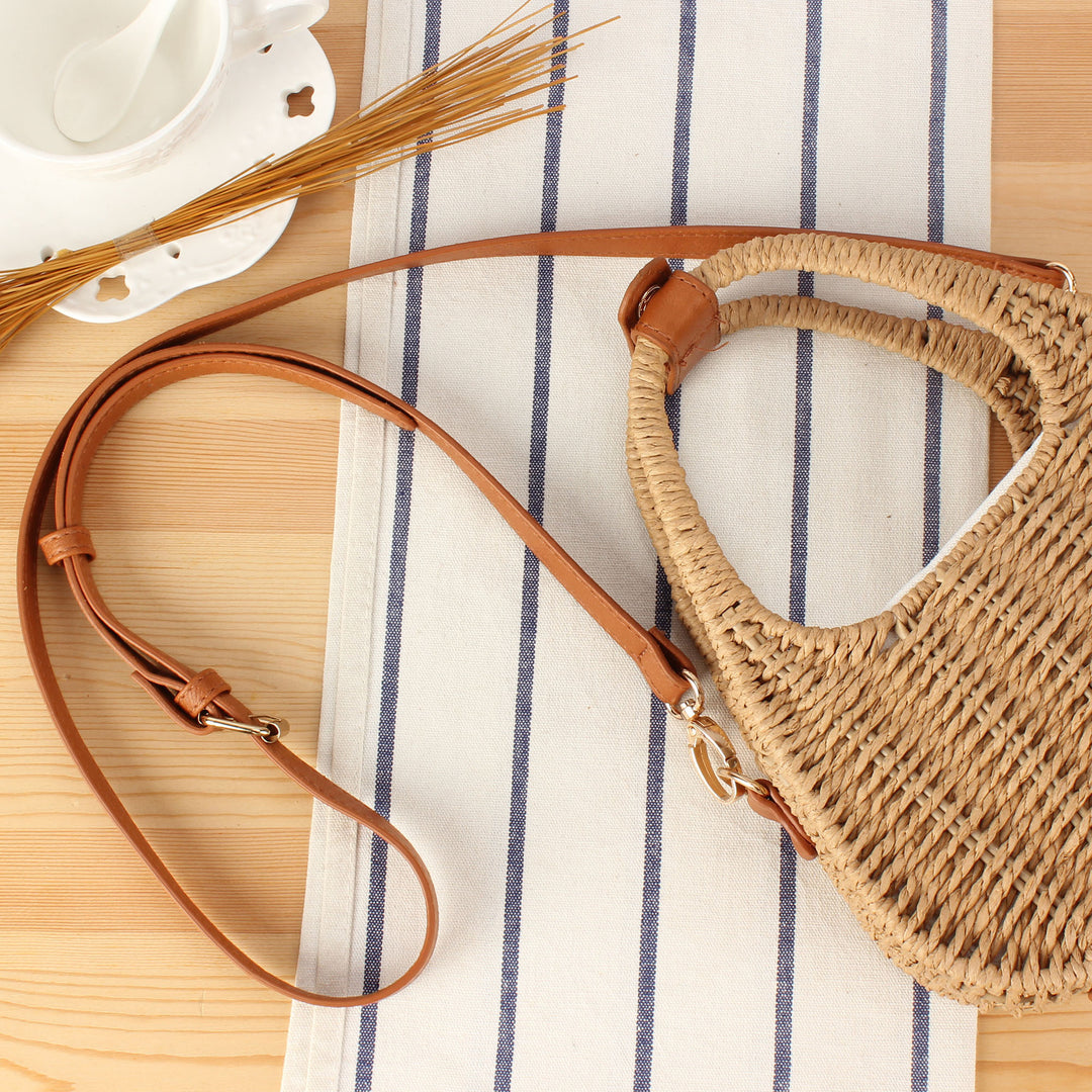 Shoulder bag made of woven natural material with elegant leather accent Stornfield
