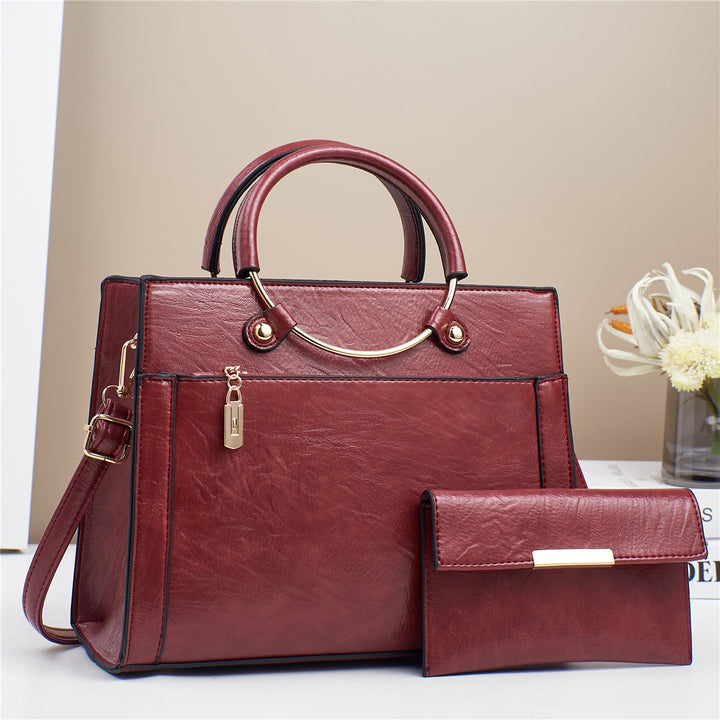 Elegant handbag with detachable shoulder strap and matching wallet Stornfield