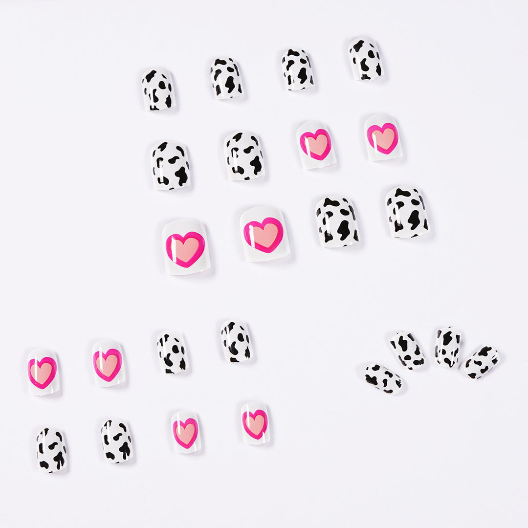 Creative nail art with heart and animal pattern motif Stornfield