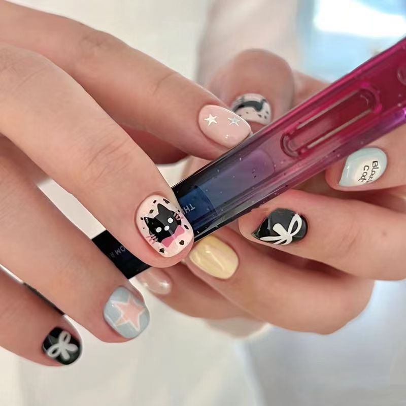 Playful Cat-Themed Press-On Nail Set Stornfield