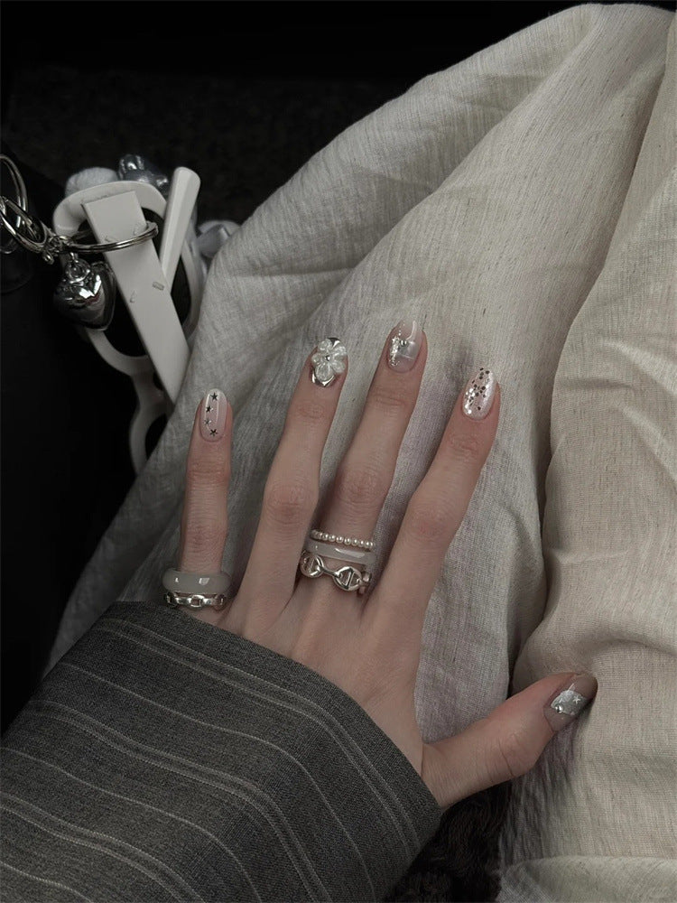 Artificial nails with decorative accents Stornfield