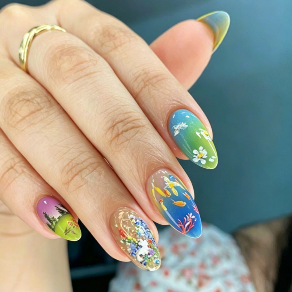 Artificial nails with artful nature and water world decoration Stornfield