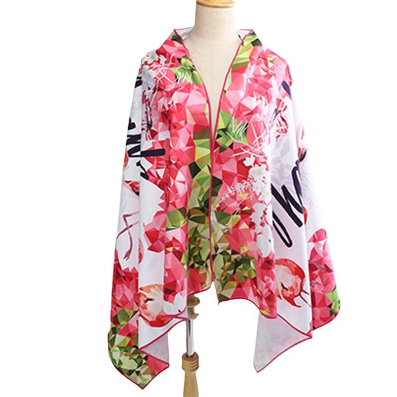Women's beach towel with colorful flamingo design Stornfield