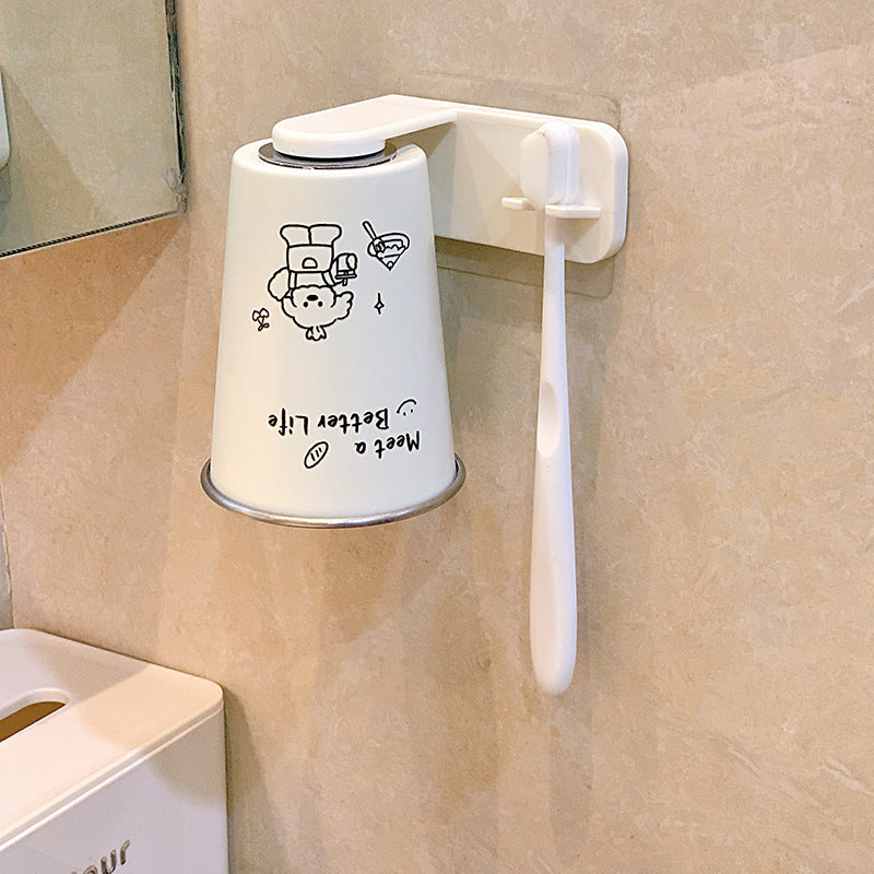 Wall-mounted toothbrush holder with playful design Stornfield
