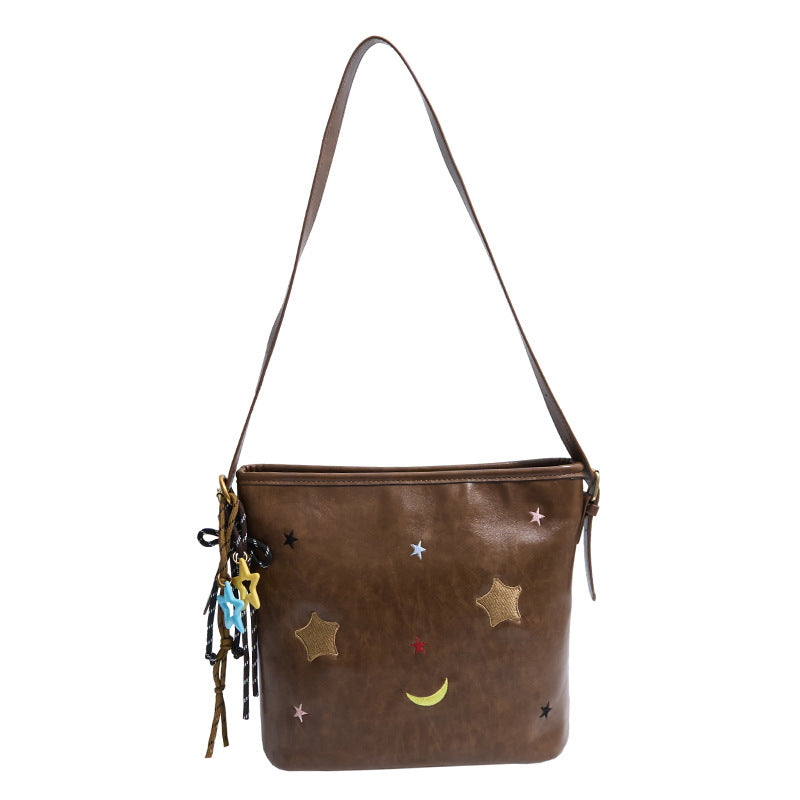 Shoulder bag with charming applications Stornfield