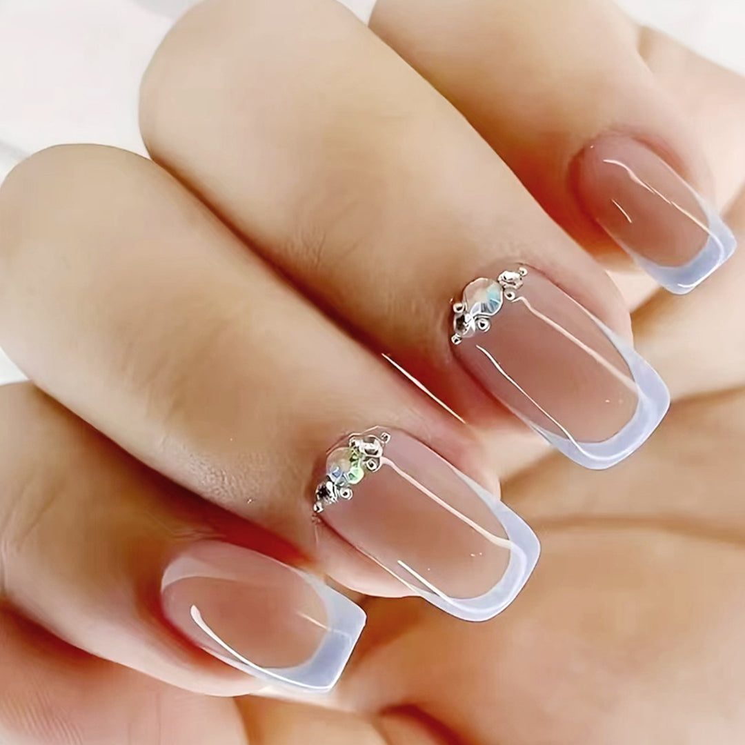 Elegant Rhinestone-Accented Acrylic Nail Extensions