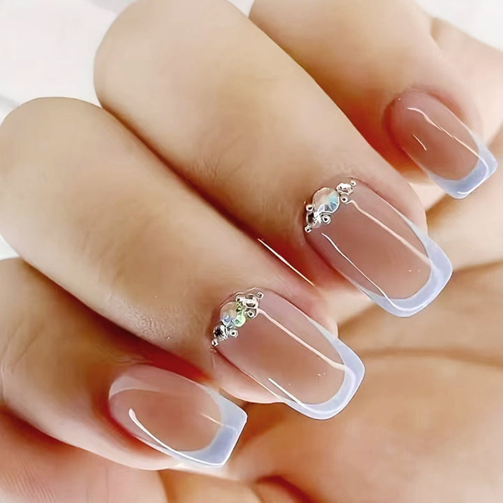 Elegant Rhinestone-Accented Acrylic Nail Extensions