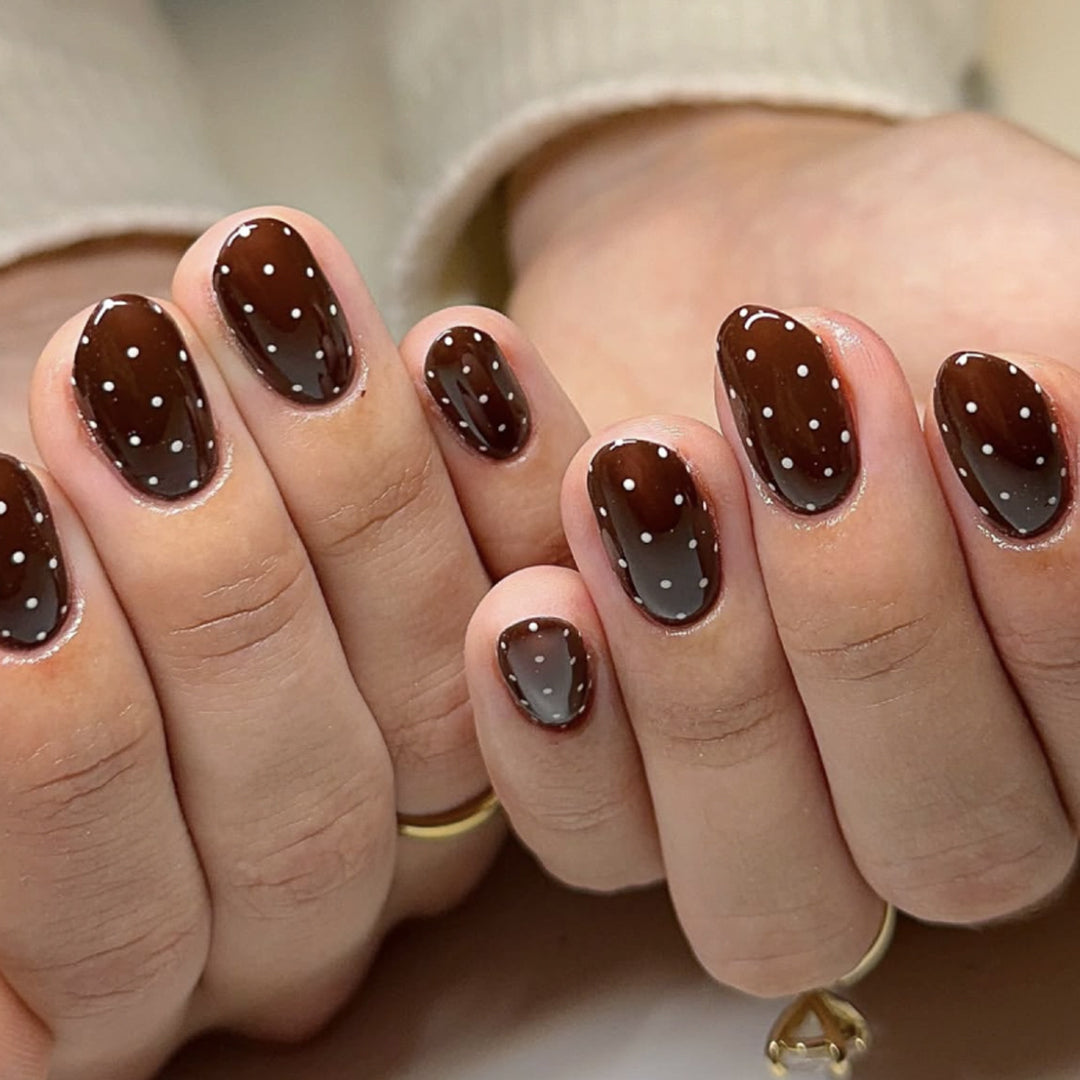 Elegant and modern nail art with polka dots Stornfield