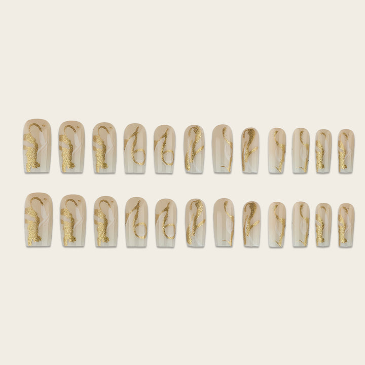 Artificial nails with elegant gold accents Stornfield