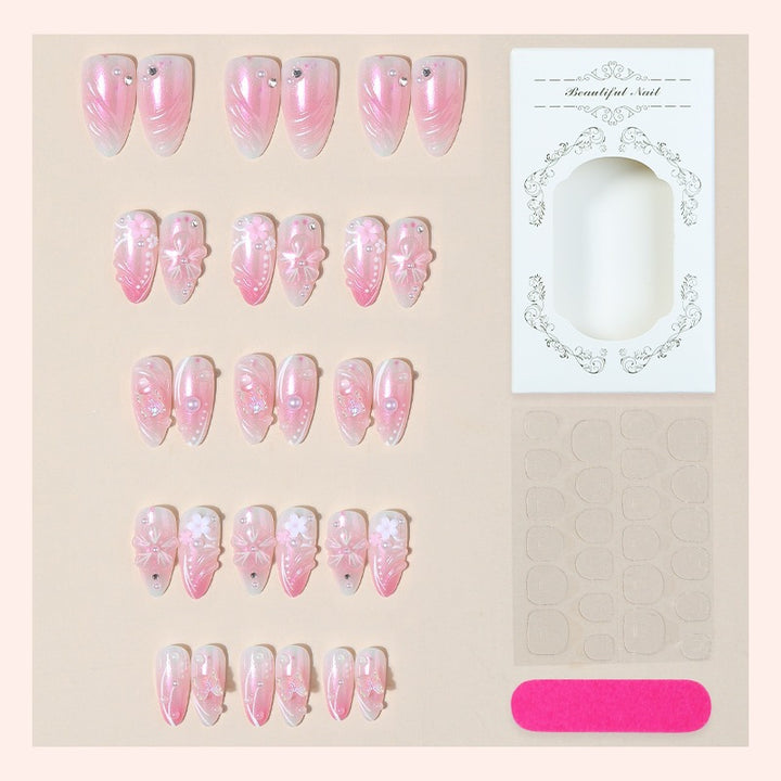 Artificial nail set with luxurious design and delicate flower accents Stornfield