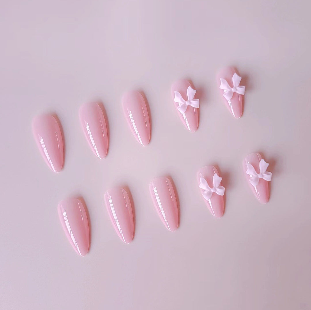 Artificial nails with elegant bow accents Stornfield