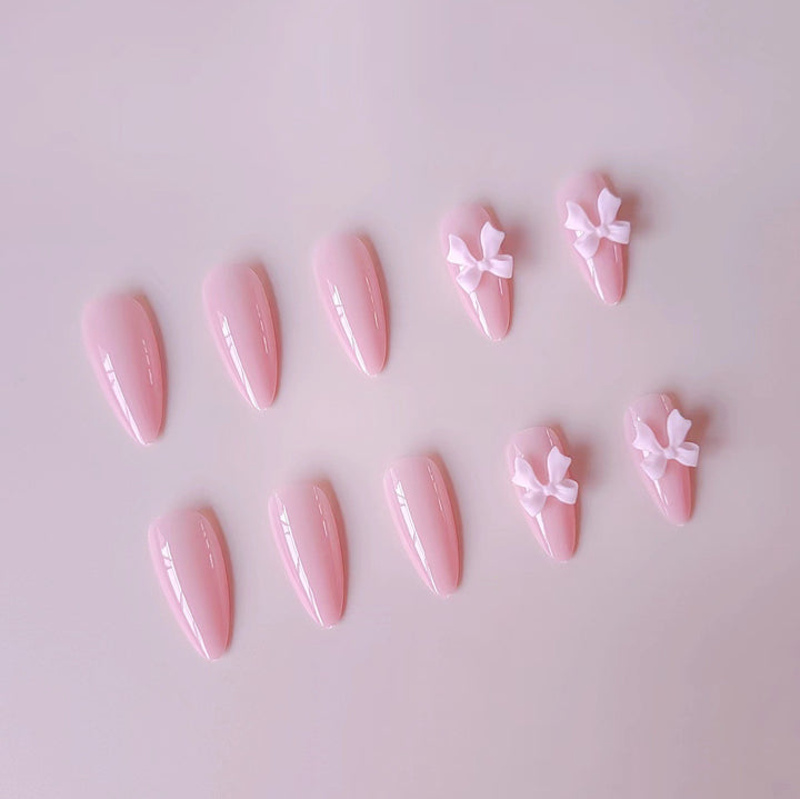Artificial nails with elegant bow accents Stornfield