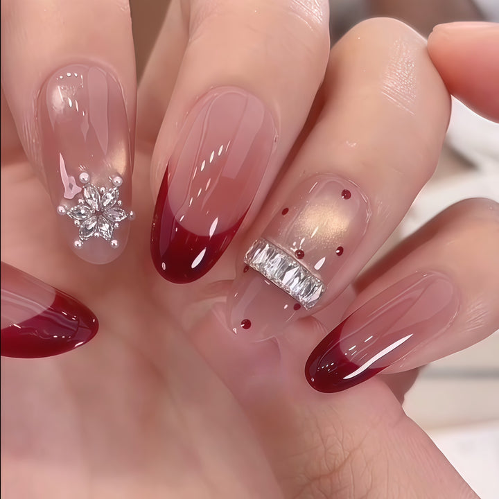 Artificial nails with festive design and rhinestone details Stornfield