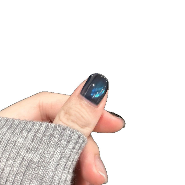 Artificial nails with elegant star design and shimmering effects Stornfield