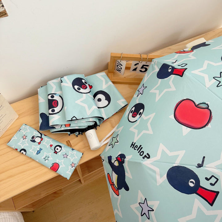 Ladies collapsible umbrella with playful penguin design Stornfield
