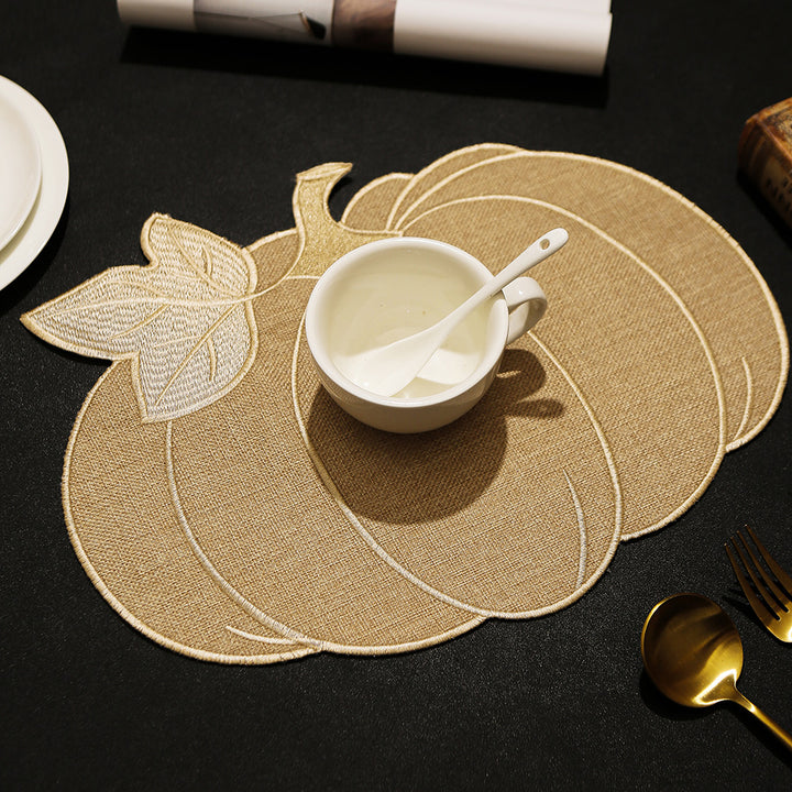 Pumpkin-shaped table set made of linen look with quilted contours and heat-resistant placemat