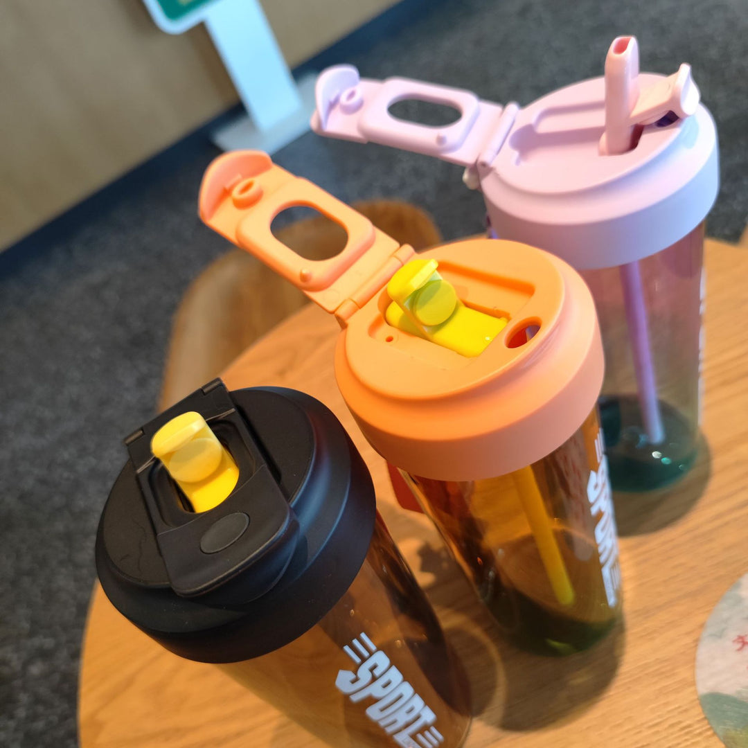 Women's sports water bottle with practical straw and carry function Stornfield