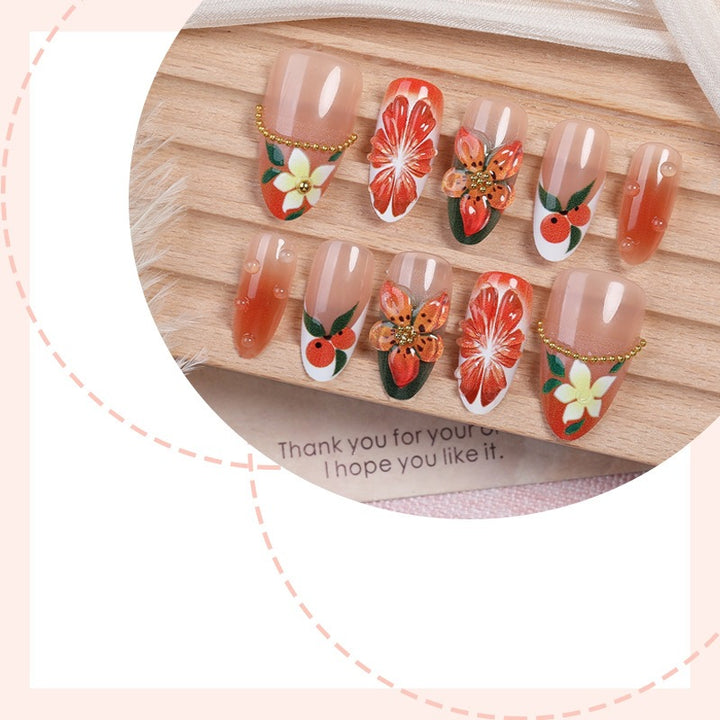Artificial nail set with floral and fruity accents Stornfield