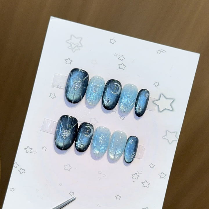 Glamorous artificial nail tips with star and glitter effects Stornfield