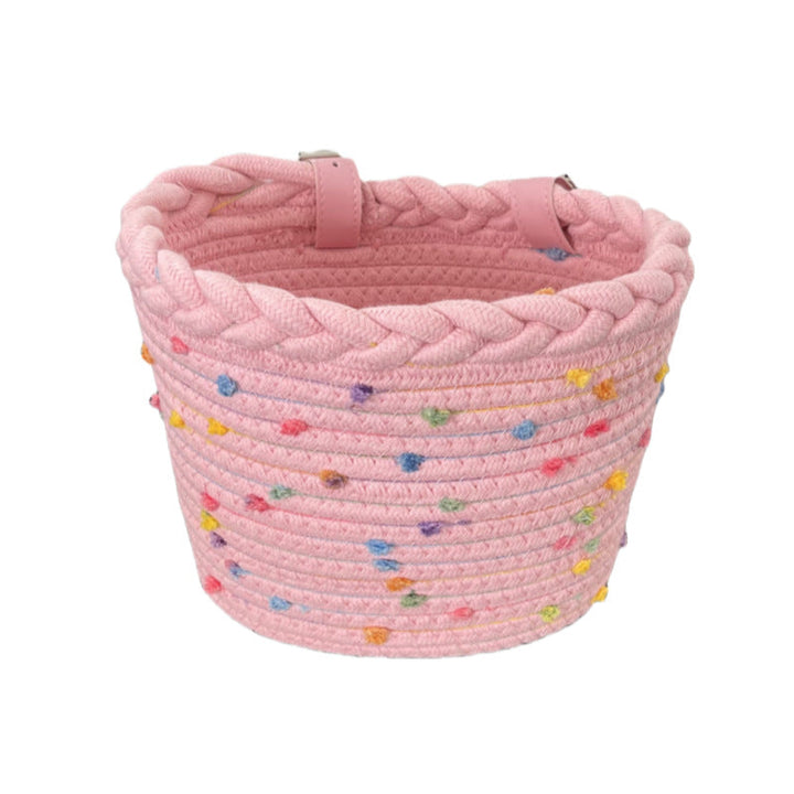 braided rope bike basket with pom pom embellishments and leather handlebar straps Stornfield